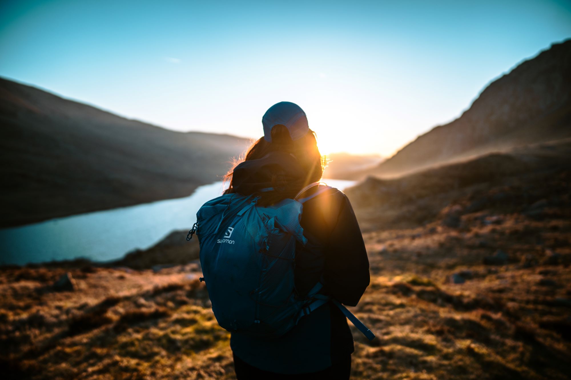 lady on a hike in the mountains